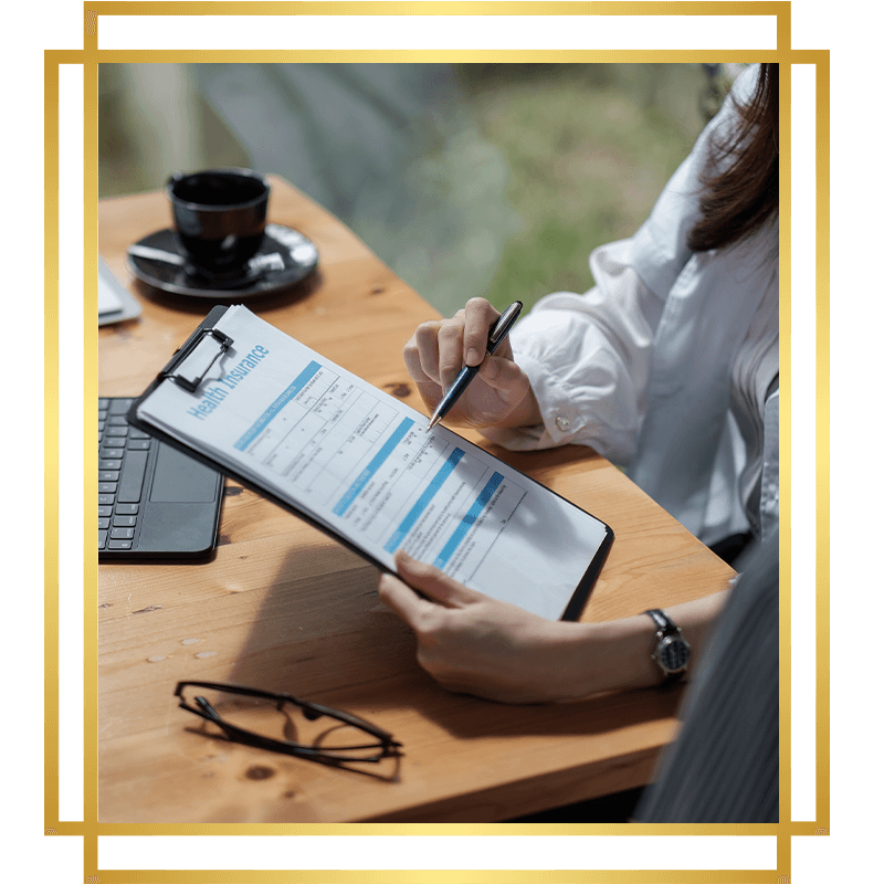 person filling out insurance