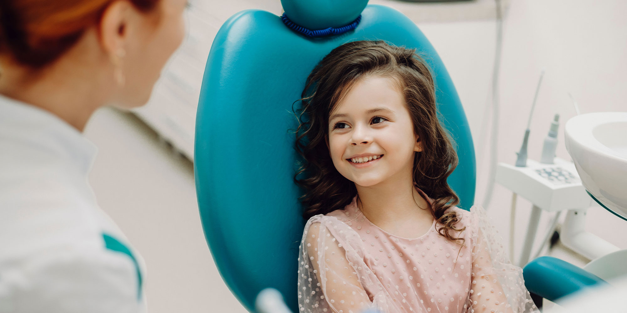 pediatric patient in blue chair