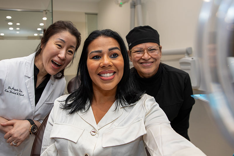 dr lee with full arch dental patient