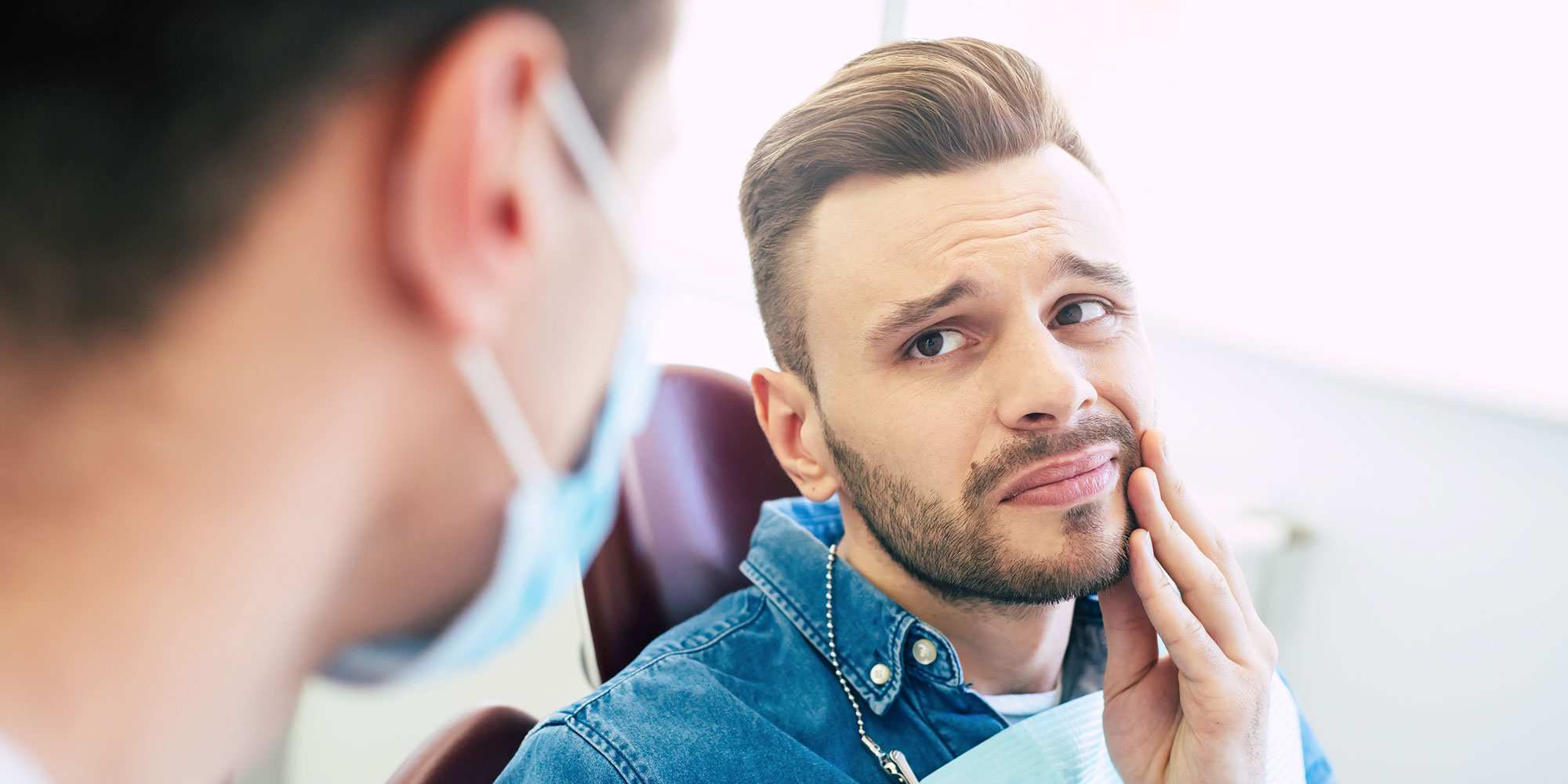 person with tooth pain