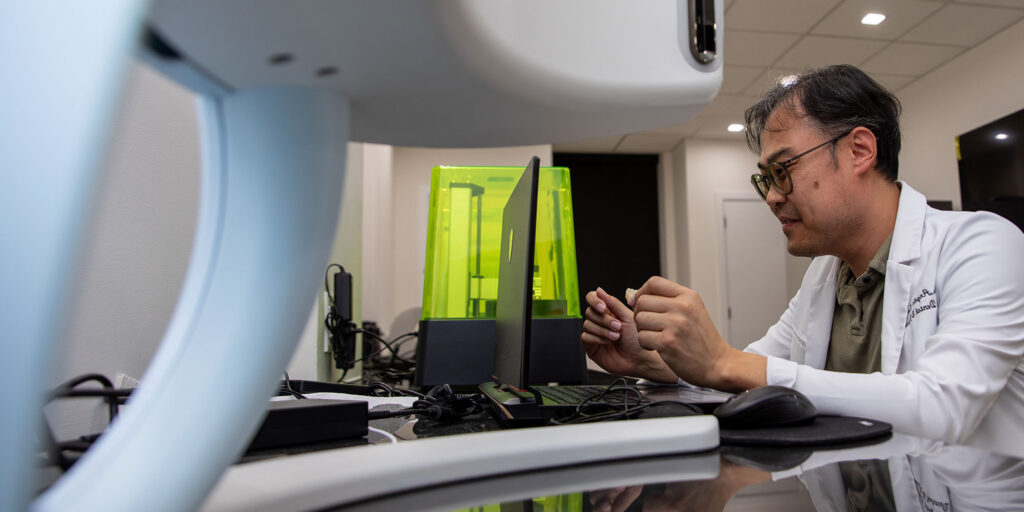 tech working with dental lab